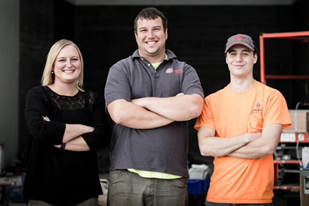 Lifeworks job coach Chelsea Skinner, Vice President Andrew Javens, and Electrical Apprentice and Lifeworks Associate Josh Meagher