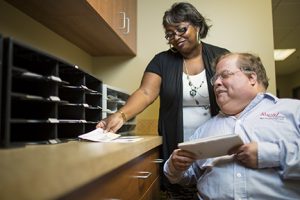 Lifeworks Associate Mike Anderson with former job coach Trina James.